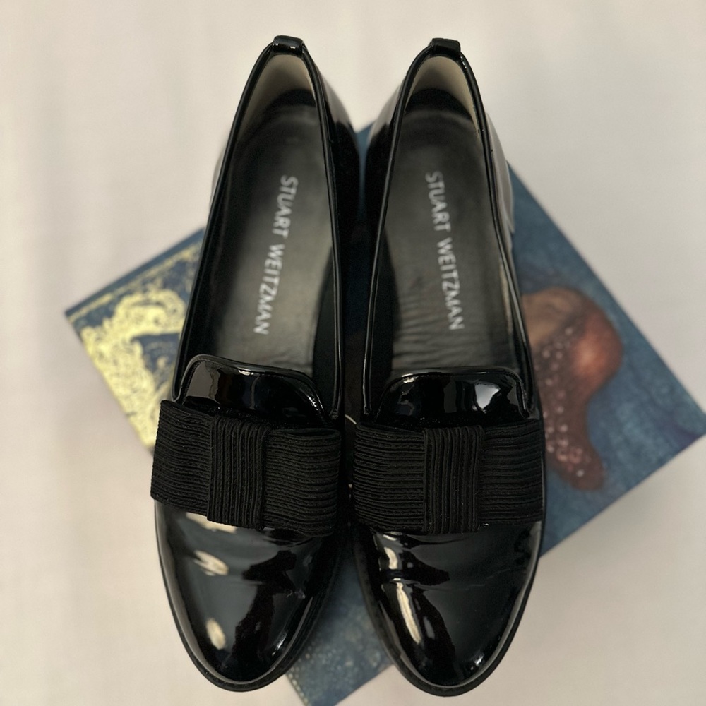 Stuart Weitzman patent leather flats with bows